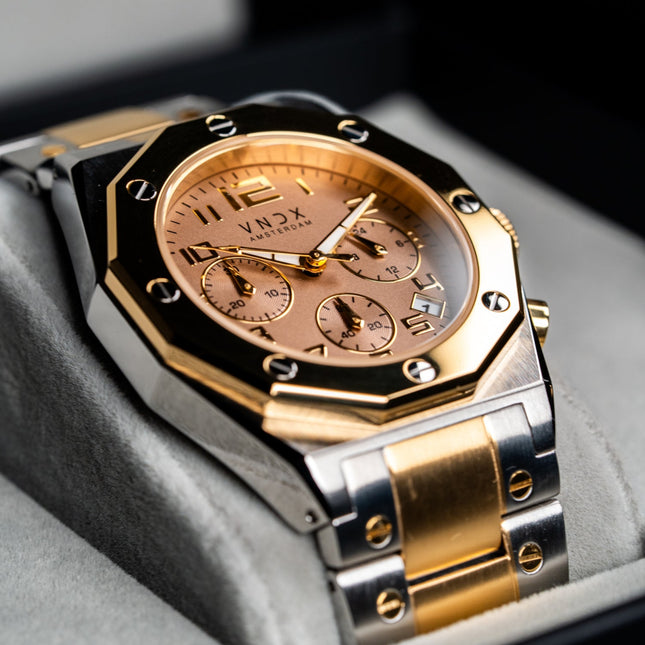 Dames horloge met zilver gouden kast en een zilver gouden band