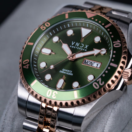 Heren horloge met zilver/rose gouden band en kast