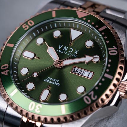 Heren horloge met zilver/rose gouden band en kast