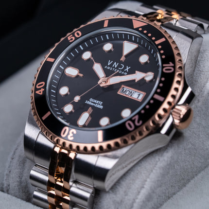 Heren horloge met zilver/rose gouden band en kast