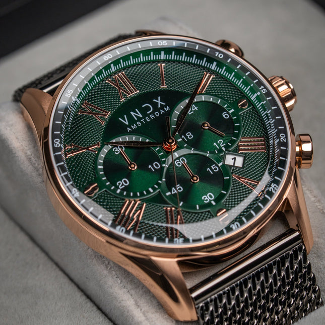 Heren horloge met stalen mesh band en rose gouden kast