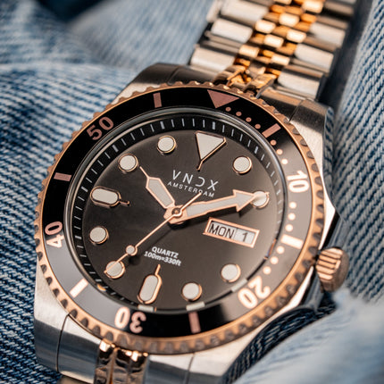 Heren horloge met zilver/rose gouden band en kast